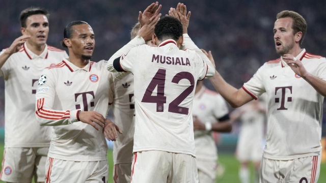 Bayern's Jamal Musiala celebrates after scoring the opening goal during the Champions League opening phase soccer match between Bayern Munich and SL Benfica, in Munich, Germany, Wednesday, Nov. 6, 2024. (AP Photo/Matthias Schrader)