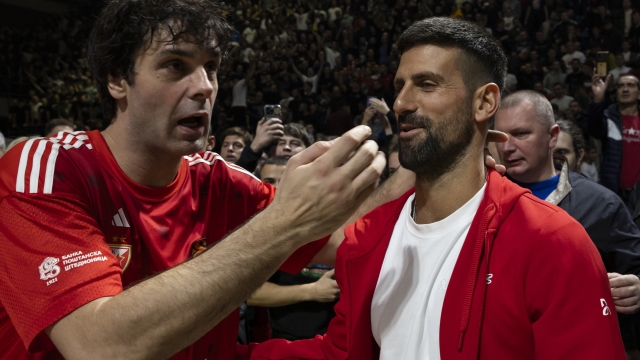 BELGRADE, SERBIA - NOVEMBER 07: Milos Teodosic, #4 of Crvena Zvezda Meridianbet Belgrade and Novak Djokovic celebrate after the Turkish Airlines EuroLeague Regular Season Round 8 match between Crvena Zvezda Meridianbet Belgrade and Alba Berlin at Aleksandar Nikolic Hall on November 07, 2024 in Belgrade, Serbia.(Photo by Srdjan Stevanovic/Euroleague Basketball via Getty Images)