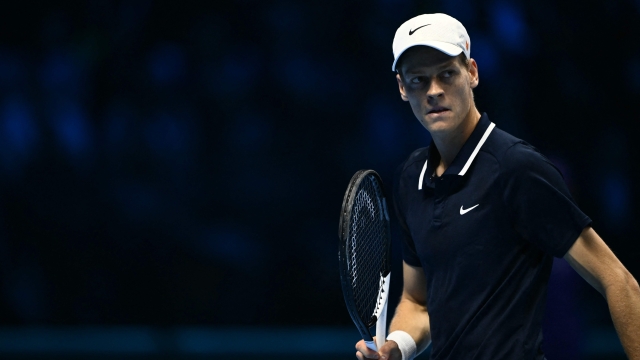 Italy's Jannik Sinner reacts during his match against Russia's Daniil Medvedev at the ATP Finals tennis tournament in Turin on November 14, 2024. (Photo by Marco BERTORELLO / AFP)