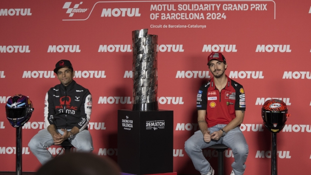 BARCELONA, SPAIN - NOVEMBER 14: Jorge Martin (L) of Spain and Prima Pramac Racing  and Francesco Bagnaia of Italy and Ducati Lenovo Team smile during the press conference pre-event during the Motul Solidarity Grand Prix of Barcelona - Previews at Circuit de Barcelona-Catalunya on November 14, 2024 in Barcelona, Spain. (Photo by Mirco Lazzari gp/Getty Images)