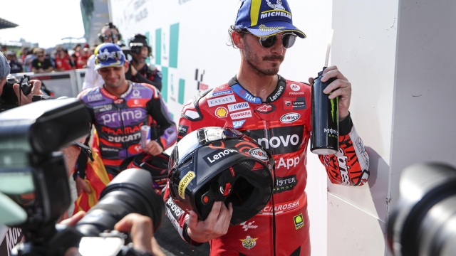 epa11698467 Winner Italian MotoGP rider Francesco Bagnaia (R) of Ducati Lenovo and second place Spanish MotoGP rider Jorge Martin (L) of Prima Pramac Racing Team react after the Malaysia Motorcycling Grand Prix 2024 at the Petronas Sepang International Circuit, in Sepang, Malaysia, 03 November 2024.  EPA/FAZRY ISMAIL