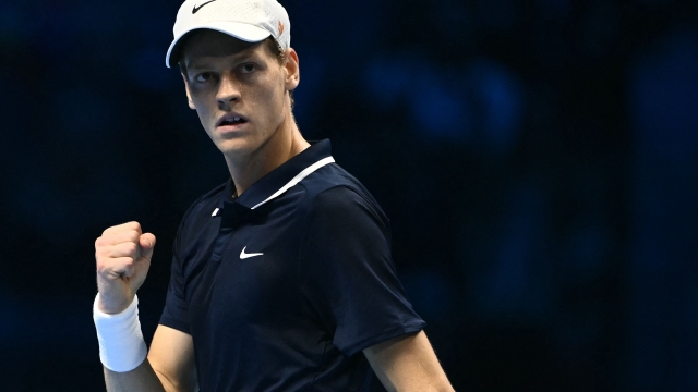 Italy's Jannik Sinner reacts during his semi-final match against Norway's Casper Ruud  at the ATP Finals tennis tournament in Turin on November 16, 2024. (Photo by Marco BERTORELLO / AFP)