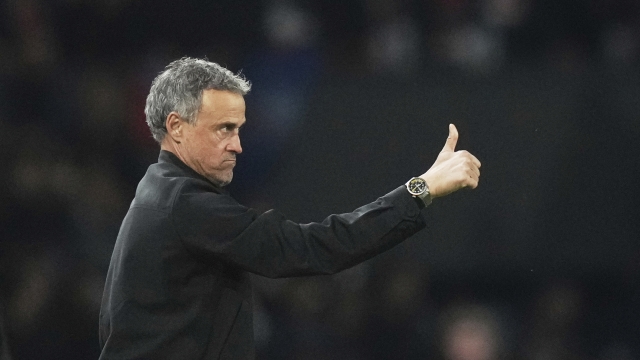 PSG's head coach Luis Enrique reacts during the Champions League quarterfinal first leg soccer match between Paris Saint-Germain and Aston Villa at Parc des Princes stadium in Paris, Wednesday, April 9, 2025. (AP Photo/Thibault Camus)