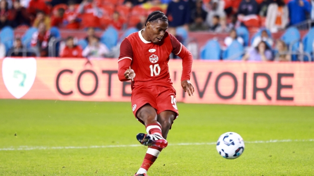 Jonathan David #10 of Canada scores in a penalty shootout during an International Friendly against Ivory Coast at BMO Field on June 10, 2025 in Toronto, Ontario, Canada. Vaughn Ridley/Getty Images/AFP (Photo by Vaughn Ridley / GETTY IMAGES NORTH AMERICA / Getty Images via AFP)