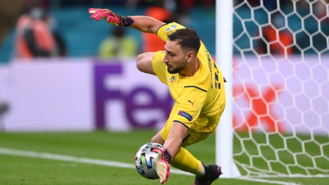  Gianluigi Donnarumma of Italy saves the fourth penalty from Alvaro Morata of Spain (not pictured) in the penalty shoot out during the UEFA Euro 2020 Championship Semi-final match between Italy and Spain at Wembley Stadium on July 06, 2021 in London, England. (Photo by Laurence Griffiths/Getty Images)