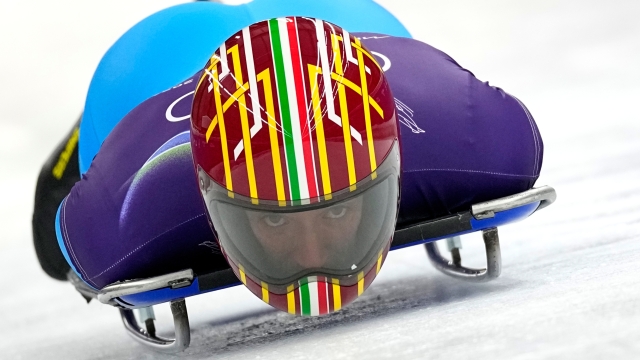 Italy's Mattia Gaspari starts for a men's skeleton training session at the 2026 Winter Olympics, in Cortina d'Ampezzo, Italy, Monday, Feb. 9, 2026. (AP Photo/Alessandra Tarantino)