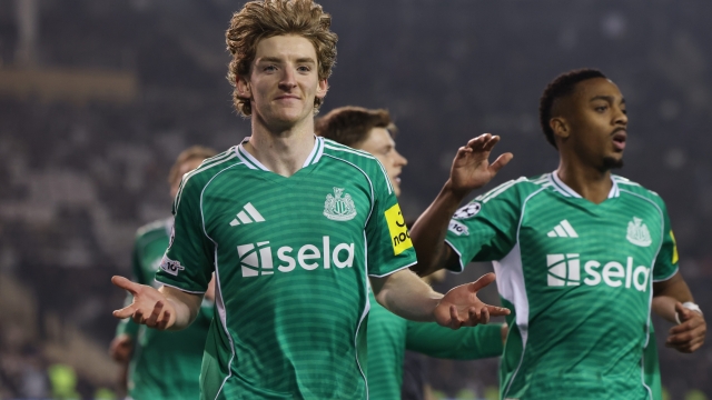 Newcastle's Anthony Gordon, left, celebrates after scoring his side's first goal during the Champions League play-off first leg soccer match between Qarabag and Newcastle in Baku, Azerbaijan, Wednesday, Feb. 18, 2026. (AP Photo)