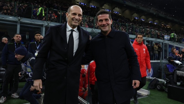   Head coach of AC Milan Massimiliano Allegri shakes hands with head coach of FC Internazionale Cristian Chivu before the Serie A match between FC Internazionale and AC Milan at Giuseppe Meazza Stadium on November 23, 2025 in Milan, Italy. (Photo by Claudio Villa/AC Milan via Getty Images)