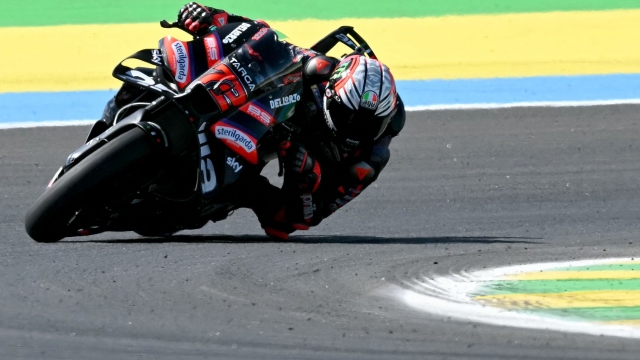 Aprilia Racing's Italian rider Marco Bezzecchi competes during the MotoGP race of the Grand Prix of Brazil, at the Ayrton Senna International racetrack in Goiania, state of Goias, Brazil, on March 22, 2026. (Photo by EVARISTO SA / AFP)