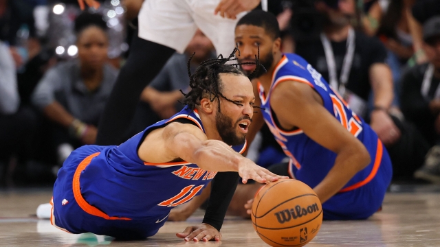  Jalen Brunson #11 of the New York Knicks reaches for a loose ball during the fourth quarter against the San Antonio Spurs in Game Five of the 2026 NBA Finals at Frost Bank Center on June 13, 2026 in San Antonio, Texas. NOTE TO USER: User expressly acknowledges and agrees that, by downloading and or using this photograph, User is consenting to the terms and conditions of the Getty Images License Agreement.   Gregory Shamus/Getty Images/AFP (Photo by Gregory Shamus / GETTY IMAGES NORTH AMERICA / Getty Images via AFP)