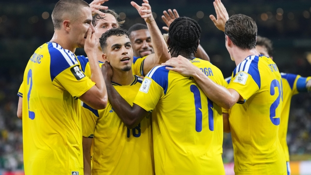 Sweden's Yasin Ayari (18) is congratulated by teammates after scoring his team's fifth goal during the World Cup Group F soccer match between Sweden and Tunisia in Guadalupe, near Monterrey, Mexico, Sunday, June 14, 2026. (AP Photo/Matias Delacroix)