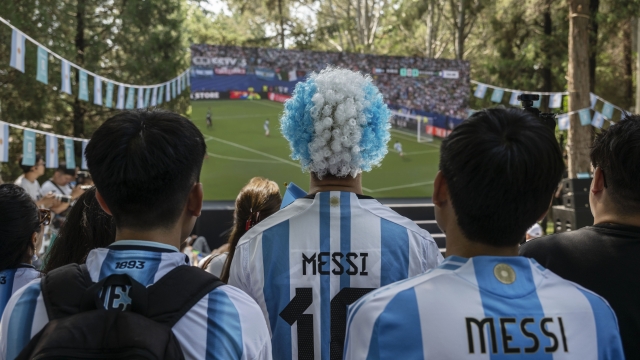  Chinese fans of Argentina wear jersey's of superstar Lionel Messi before their match against Algeria at a viewing event at the Argentinian Embassy on June 17, 2026 in Beijing, China. Argentina won 3-0, with Messi scoring all three. Messi and the Argentinian team are hugely popular with mainland China football fans. China's national team failed to qualify for the World Cup in 2026, and only qualified once in 2002. (Photo by Kevin Frayer/Getty Images)