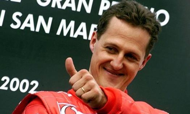 Michael Schumacher ha vinto 7 volte a Imola: qui è sul podio del 2002. Ansa