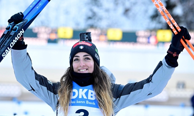 Italy's Lisa Vittozzi celebrates after winning the women's 10km pursuit event of the IBU Biathlon World Cup in Ruhpolding, southern Germany on January 14, 2024. (Photo by Tobias SCHWARZ / AFP)