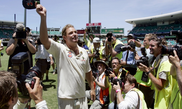 FILE - In this Jan. 5, 2007, file photo, Australian bowler Shane Warne waves as he leaves the field in his last match following their win over of England in the fifth and final Ashes cricket test in Sydney, Australia. Shane Warne, one of the greatest cricket players in history, has died. He was 52. Fox Sports television, which employed Warne as a commentator, quoted a family statement as saying he died of a suspected heart attack in Koh Samui, Thailand, Friday March 4. (AP Photo/Mark Baker,File)
