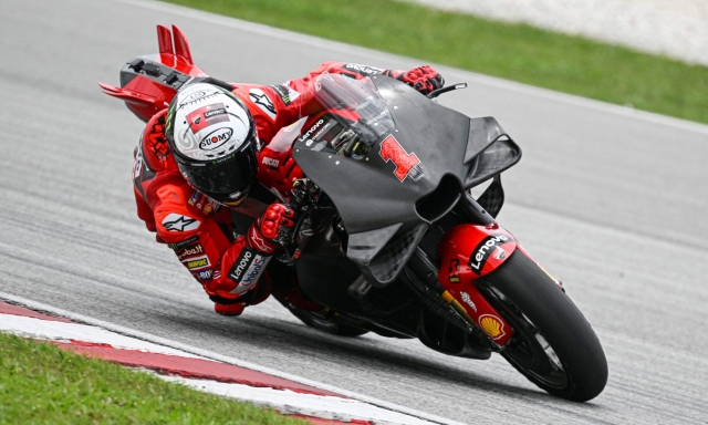 Ducati Lenovo's Italian rider Francesco Bagnaia takes a corner during the second day of the pre-season MotoGP winter test at the Sepang International Circuit in Sepang on February 11, 2023. (Photo by Mohd RASFAN / AFP)