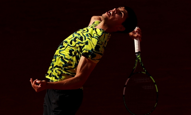 MADRID, SPAIN - MAY 03:  Carlos Alcaraz of Spain serves against Karen Khachanov during the Men's Singles Quarter-Final match on Day Ten of the Mutua Madrid Open at La Caja Magica on May 03, 2023 in Madrid, Spain. (Photo by Clive Brunskill/Getty Images)