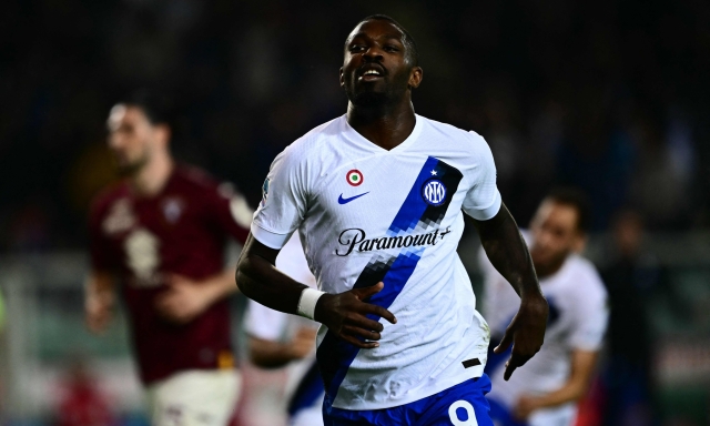 Inter Milan's French forward #09 Marcus Thuram celebrates after scoring during the Italian Serie A football match between Torino and Inter Milan, at Torino's Olympic Stadium, in Turin on October 21, 2023. (Photo by Marco BERTORELLO / AFP)