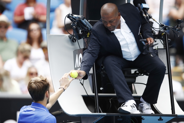  Daniil Medvedev of Russia shows the ball to chair umpire Carlos Bernardes during his Men's Singles fourth round match against Stan Wawrinka of Switzerland on day eight of the 2020 Australian Open at Melbourne Park on January 27, 2020 in Melbourne, Australia. (Photo by Daniel Pockett/Getty Images)