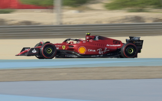 Ferrari's Spanish driver Carlos Sainz Jr drives during the first day of Formula One (F1) pre-season testing at the Bahrain International Circuit in the city of Sakhir on March 10, 2022. (Photo by Mazen Mahdi / AFP)