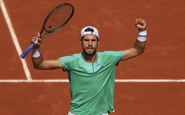 Russia's Karen Khachanov celebrates after winning against France's Constant Lestienne during their first round match of the French Open tennis tournament at the Roland Garros stadium in Paris, Sunday, May 28, 2023. (AP Photo/Aurelien Morissard)