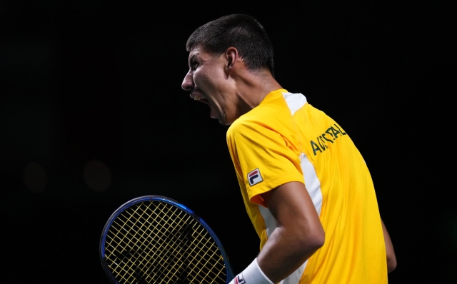 Alexei Popyrin of Australia reacts after winning a point against Matteo Arnaldi of Italy during a Davis Cup final tennis match between Australia and Italy in Malaga, Spain, Sunday, Nov. 26, 2023. (AP Photo/Manu Fernandez)