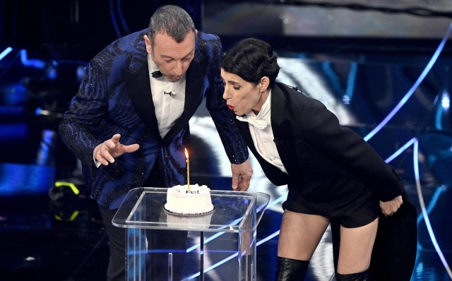 Sanremo Festival host and artistic director Amadeus (L) and Italian singer Giorgia on stage at the Ariston theatre during the 74th Sanremo Italian Song Festival in Sanremo, Italy, 07 February 2024. The music festival runs from 06 to 10 February 2024.   ANSA/RICCARDO ANTIMIANI