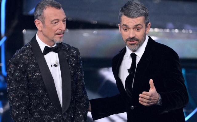 Sanremo Festival host and artistic director Amadeus (L) and Italian actor Luca Argentero on stage at the Ariston theatre during the 74rd Sanremo Italian Song Festival, Sanremo, Italy, 10 February 2024. The music festival will run from 06 to 10 February 2024.  ANSA/ETTORE FERRARI