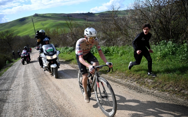 Slovenian Tadej Pogacar, team UEA, takes the lead of the 18th one-day classic 'Strade Bianche' (White Roads) cycling race between Siena and Siena, Tuscany, on March 2, 2024. (Photo by Marco BERTORELLO / AFP)