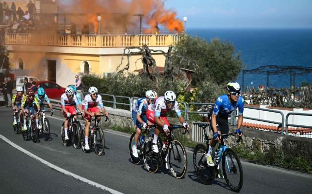 Movistar Team's Spanish rider Sergio Samitier (R) and Team Polti Kometa Italian rider Mirco Maestri (2nd R) ride in breakaway during the 115th Milan-SanRemo one-day classic cycling race, between Pavia and SanRemo, on March 16, 2024. (Photo by Marco BERTORELLO / AFP)