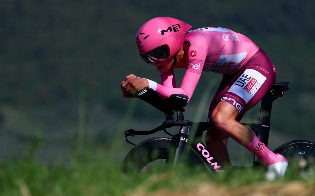 Team UAE's Slovenian rider Tadej Pogacar competes during the 7th stage of the 107th Giro d'Italia cycling race, an individual time trial between Foligno and Perugia, on May 10, 2024 in Foligno. (Photo by Luca Bettini / AFP)