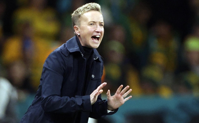 FILE - Canada's head coach Bev Priestman gestures during the Women's World Cup Group B soccer match between Australia and Canada in Melbourne, Australia, Monday, July 31, 2023. FIFA deducted six points from Canada in the Paris Olympics women?s soccer tournament and banned three coaches, including Priestman, for one year each on Saturday, July 27, 2204, in a drone spying scandal. (AP Photo/Hamish Blair, File)