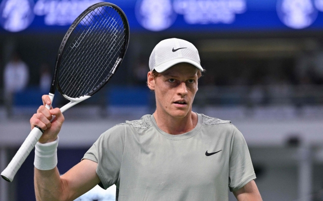 Italy's Jannik Sinner reacts after a point against Czech Republic's Tomas Machac during their men's singles semi-final match at the Shanghai Masters tennis tournament in Shanghai on October 12, 2024. (Photo by HECTOR RETAMAL / AFP)