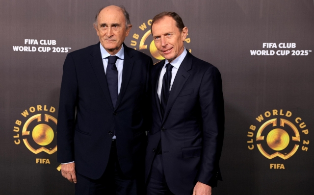 epa11758885 Real Madrid director Emilio Butragueno (R) and honorary president Pirri arrive for the FIFA Club World Cup 2025 Draw in Miami, USA, 05 December 2024. FIFA's new club competition will be played for the first time from 15 June to 13â?¯July 2025 in 12 stadiums across the USA.  EPA/CRISTOBAL HERRERA-ULASHKEVICH