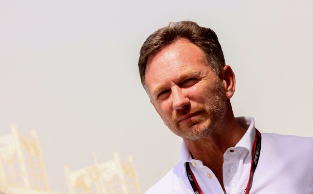 Red Bull Racing's team principal Christian Horner arrives for the second day of Formula One (F1) pre-season testing at the Bahrain International Circuit in the city of Sakhir on March 11, 2022. (Photo by Giuseppe CACACE / AFP)