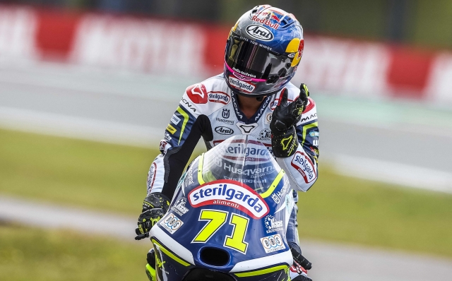 Japan's rider Ayumu Sasaki reacts on his Husqvarna after setting the fastest time in the Moto3 qualifying session at the TT circuit of Assen on June 25, 2022. (Photo by Vincent Jannink / ANP / AFP) / Netherlands OUT