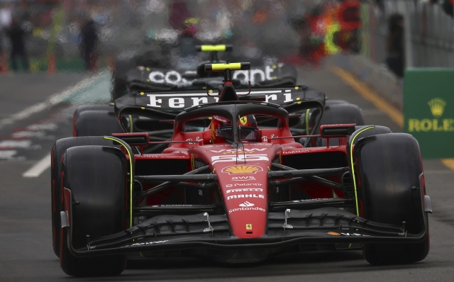 Ferrari driver Carlos Sainz of Spain prepares to leave the pit during qualifying ahead of the Australian Formula One Grand Prix at Albert Park in Melbourne, Saturday, April 1, 2023. (AP Photo/Asanka Brendon Ratnayake)