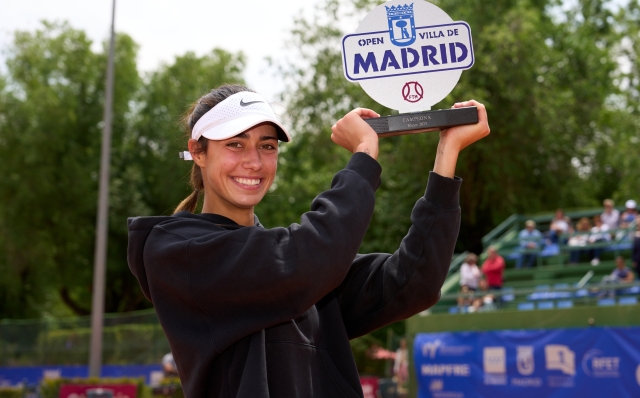 MADRID, SPAIN - MAY 21: Olga Danilovic of Serbia celebrates with the trophy after defeating Sara Sorribes of Spain during the women's final match of the 2023 ITF World Tennis Tour W100 Madrid at Club de Campo Villa de Madrid on May 21, 2023 in Madrid, Spain. (Photo by Angel Martinez/Getty Images for ITF)