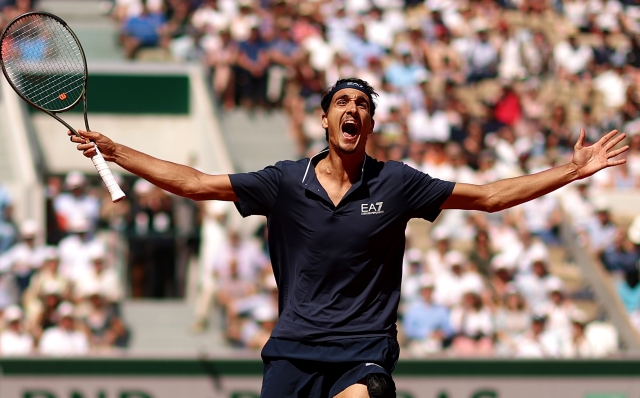 PARIS, FRANCE - JUNE 02: Lorenzo Sonego of Italy celebrates after winning match point against Andrey Rublev during the Men's Singles Third Round match on Day Six of the 2023 French Open at Roland Garros on June 02, 2023 in Paris, France. (Photo by Clive Brunskill/Getty Images)