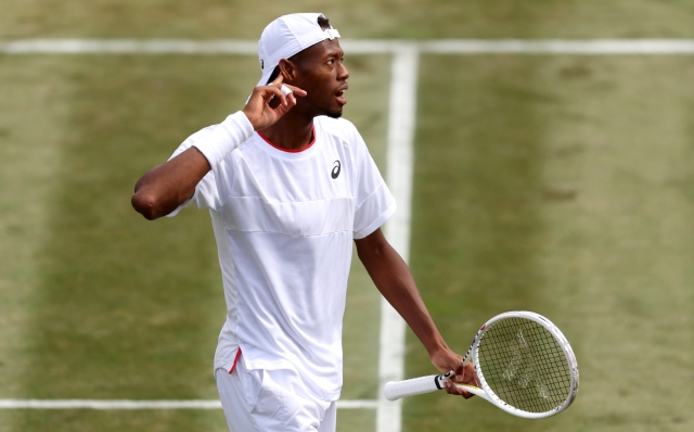 LONDON, ENGLAND - JULY 10: Christopher Eubanks of United States celebrates against Stefanos Tsitsipas of Greece in the Men's Singles fourth round match during day eight of The Championships Wimbledon 2023 at All England Lawn Tennis and Croquet Club on July 10, 2023 in London, England. (Photo by Clive Brunskill/Getty Images)