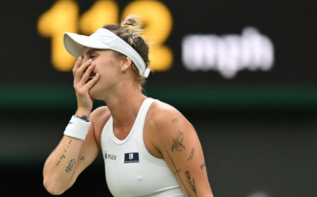 Czech Republic's Marketa Vondrousova reacts to beating US player Jessica Pegula during their women's singles quarter-finals tennis match on the ninth day of the 2023 Wimbledon Championships at The All England Tennis Club in Wimbledon, southwest London, on July 11, 2023. (Photo by Glyn KIRK / AFP) / RESTRICTED TO EDITORIAL USE