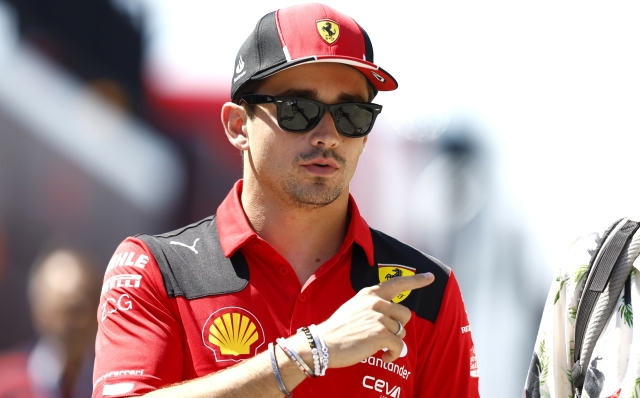 BUDAPEST, HUNGARY - JULY 20: Charles Leclerc of Monaco and Ferrari walks in the Paddock during previews ahead of the F1 Grand Prix of Hungary at Hungaroring on July 20, 2023 in Budapest, Hungary. (Photo by Francois Nel/Getty Images)