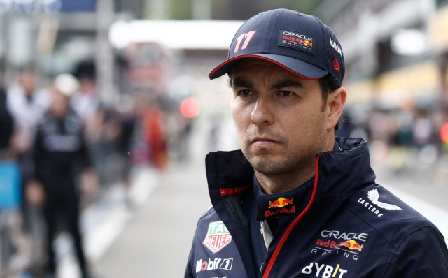 Red Bull Racing's Mexican driver Sergio Perez looks on in the pits before the   sprint race ahead of the Formula One Belgian Grand Prix at the Spa-Francorchamps Circuit in Spa on July 29, 2023. (Photo by KENZO TRIBOUILLARD / POOL / AFP)