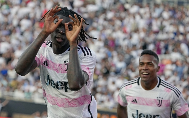 Juventus forward Moise Kean gestures to fans after scoring a goal against Real Madrid during the first half of a Champions Cup soccer match, Wednesday, Aug. 2, 2023, in Orlando, Fla. (AP Photo/John Raoux)