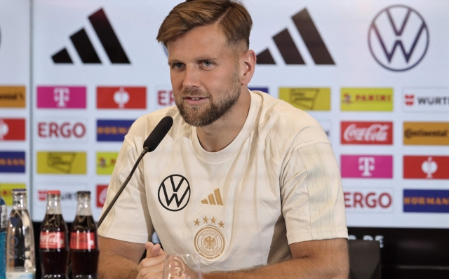 Germany's forward Niclas Fullkrug addresses journalists during a press conference in Frankfurt am Main, western Germany, on June 11, 2023, on the eve of the friendly football match between Germany and Ukraine to be played in Bremen, northern Germany. (Photo by Daniel ROLAND / AFP)