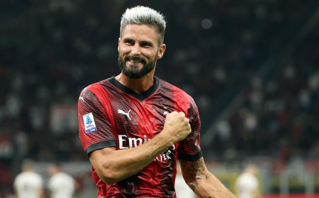 AC Milan's Olivier Giroud jubilates after scoring goal of 2 to 1 during the Italian serie A soccer match between AC Milan and Torino at Giuseppe Meazza stadium in Milan, 26 August 2023. ANSA / MATTEO BAZZI