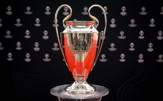 This photograph taken on August 31, 2023, shows the UEFA Champions League football trophy cup during the ceremony for the draw of the UEFA Champions League football tournament 2023-2024 at The Grimaldi Forum in the Principality of Monaco. (Photo by NICOLAS TUCAT / AFP)