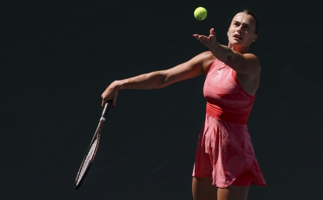 Aryna Sabalenka, of Belarus, serves to Clara Burel, of France, during the third round of the U.S. Open tennis championships, Saturday, Sept. 2, 2023, in New York. (AP Photo/Andres Kudacki)