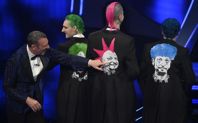 Sanremo Festival host and artistic director Amadeus (L) and Italian band La Sad on stage at the Ariston theatre during the 74th Sanremo Italian Song Festival in Sanremo, Italy, 07 February 2024. The music festival runs from 06 to 10 February 2024.   ANSA/RICCARDO ANTIMIANI