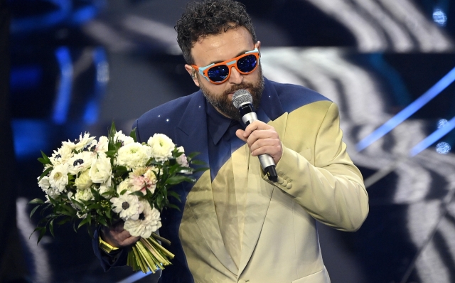 Italian singer Dargen D'Amico performs on stage at the Ariston theatre during the 74th Sanremo Italian Song Festival in Sanremo, Italy, 07 February 2024. The music festival runs from 06 to 10 February 2024.   ANSA/RICCARDO ANTIMIANI